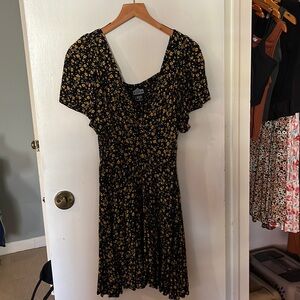 Black and yellow floral gauze dress. Preshrunk about 1 size to a perfect XS